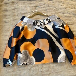 Anthropologie Multicolor Orange Cream and Black scoop fold over 60s top